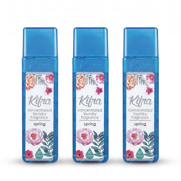 Three bottles of Kifra Spring concentrated laundry perfume, 200ml each, standing in a row on a white background